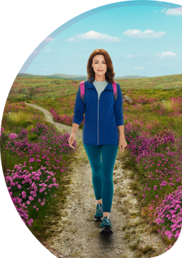 Woman walking down a trail